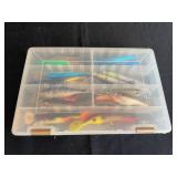 Collection of Various Fishing Lures in Tackle Box