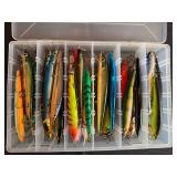 Lot of Fishing Lures in Tackle Box with various Jerk and Rogue Styles