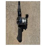 Pair of Shimano and Daiwa Fishing Rods with Reels