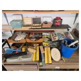 Collection of Workshop Tools and Accessories with Sanding Belts and Drill Bits