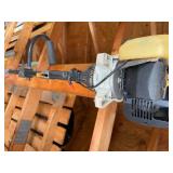 Gas-Powered String Trimmer with Curved Shaft