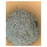 Assorted Industrial Supplies: Nails, Chains, Rope in Metal Buckets