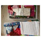 Storage Containers full of Giftwrap and Bags