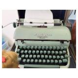 Collection with Typewriter, Marbles, Pet Dog & Shelves