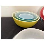 A Great Collection of Pyrex Bowls and One Set in Flamingo Pink Plus a Glassbake Piece