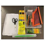 Collection of School Supplies including Pencils and Scissors