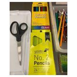 Collection of School Supplies including Pencils and Scissors