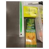 Collection of School Supplies including Pencils and Scissors