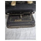 Sad Irons and Scotch Tape Dispenser and Vintage Check Printer (?)