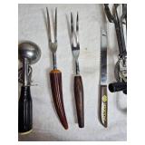 Kitchen Utensil Collection with Rolling Pins, Peelers, and More