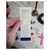 Mixed Lot Including Bell, Artistry Booklet, and Various Toys