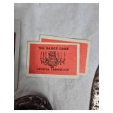 Mixed Lot Including Bell, Artistry Booklet, and Various Toys