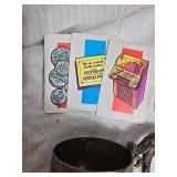 Mixed Lot Including Bell, Artistry Booklet, and Various Toys