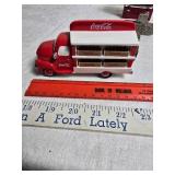 Coca-Cola Memorabilia: Bottle Openers, Spoon, Toy Truck and Including Decorative Display Case