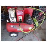 Red air compressor with Green hose