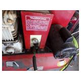Red air compressor with Green hose