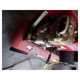 Red air compressor with Green hose