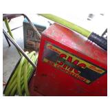 Red air compressor with Green hose