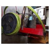 Red air compressor with Green hose