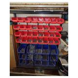 Blue and Orange Containers with hardware and Tool shop shelf