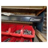 Blue and Orange Containers with hardware and Tool shop shelf