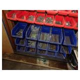 Blue and Orange Containers with hardware and Tool shop shelf
