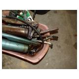 Grease guns in pink container