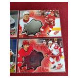 (4) Numbered 2021-22 Upper Deck Hockey Cards