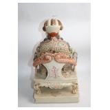 Intricately Detailed Porcelain Sculpture of Asian Deity