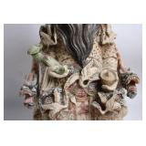 Intricately Detailed Porcelain Sculpture of Asian Deity