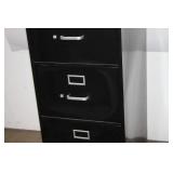 Used 4-Drawer Black Metal Filing Cabinet