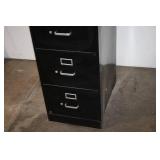Used 4-Drawer Black Metal Filing Cabinet