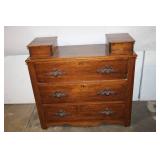 Antique Wooden Dresser with Unique Carved Handles