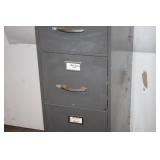 Used 4-Drawer Metal Filing Cabinet