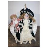 Set of 2 Porcelain Dolls on Wicker Chair