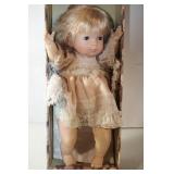 Vintage Porcelain Baby Doll with Lace Dress