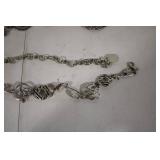 Pair of Vintage Metal Belts with Intricate Designs