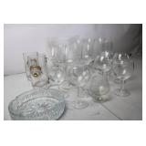 Collection of Various Glassware Including Beer Mugs, Wine Goblets, and Serving Dish