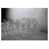 Collection of Various Glassware Including Beer Mugs, Wine Goblets, and Serving Dish