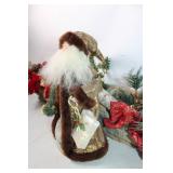 Festive Holiday Centerpiece with Santa Figurine and Decor