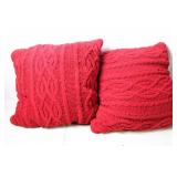 Pair of Red Knitted Throw Cushions with Intricate Patterns