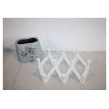 Decorative Ceramic Vase with White Foldable Shoe Rack