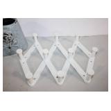 Decorative Ceramic Vase with White Foldable Shoe Rack
