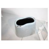 Decorative Ceramic Vase with White Foldable Shoe Rack