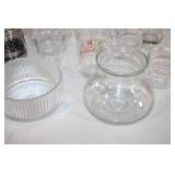 Assorted Glassware Collection Featuring Vases, Cups, and Jars