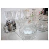 Assorted Glassware Collection Featuring Vases, Cups, and Jars