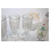 Assorted Glassware Collection Featuring Vases, Cups, and Jars