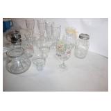 Assorted Glassware Collection Featuring Vases, Cups, and Jars