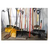 Collection of Assorted Snow Shovels, Spades, and Garden Tools