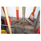 Collection of Assorted Snow Shovels, Spades, and Garden Tools